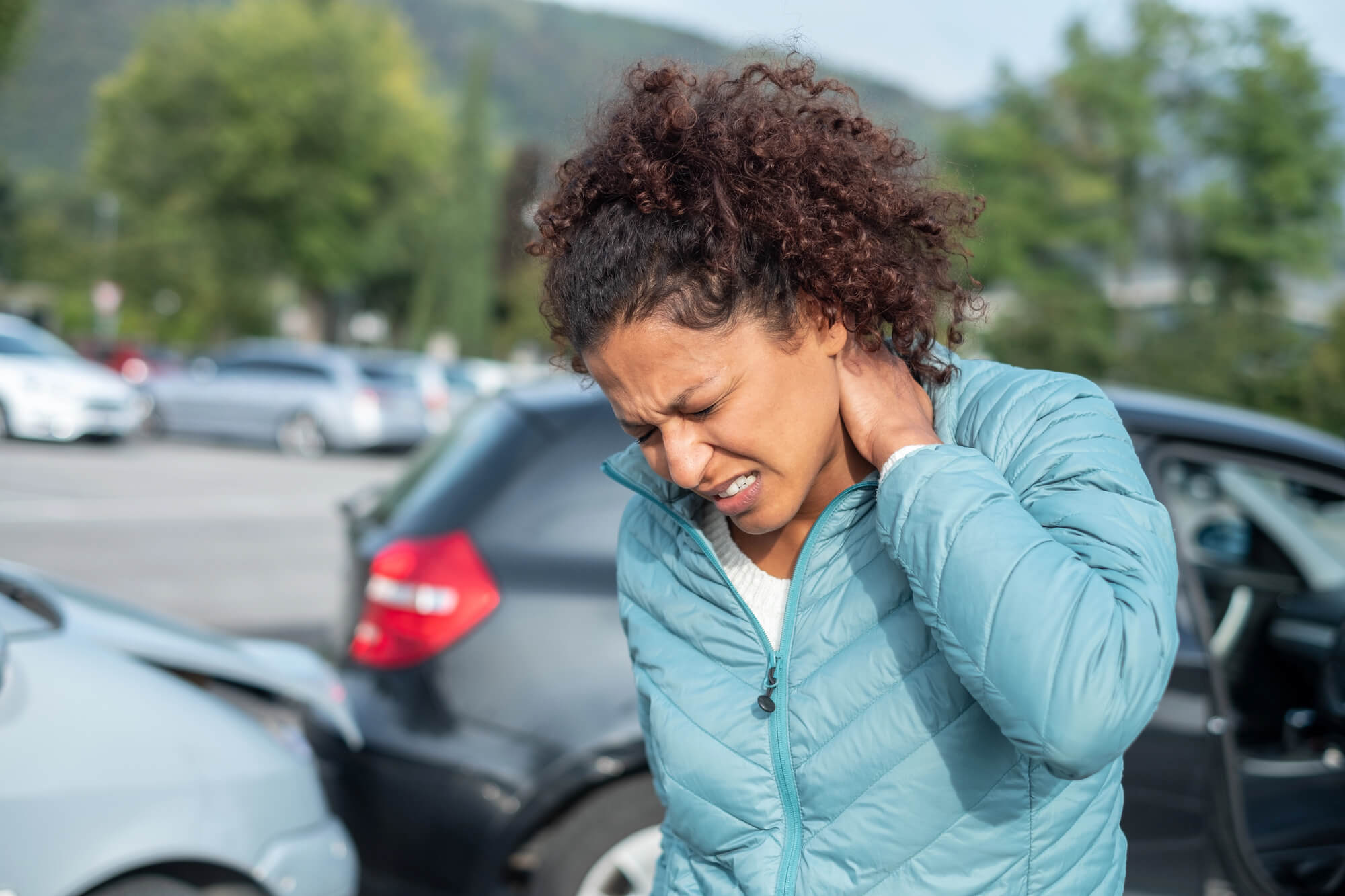 Person with neck pain after a car accident in Albuquerque